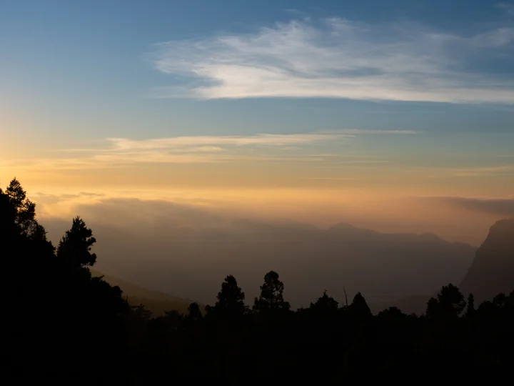 Sun rise over mountains scape.