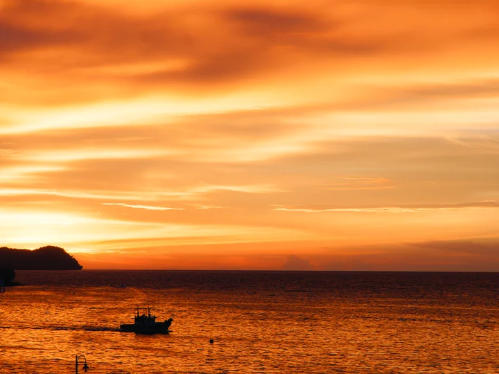 Sunset with boat in Kota Kinabalu. 