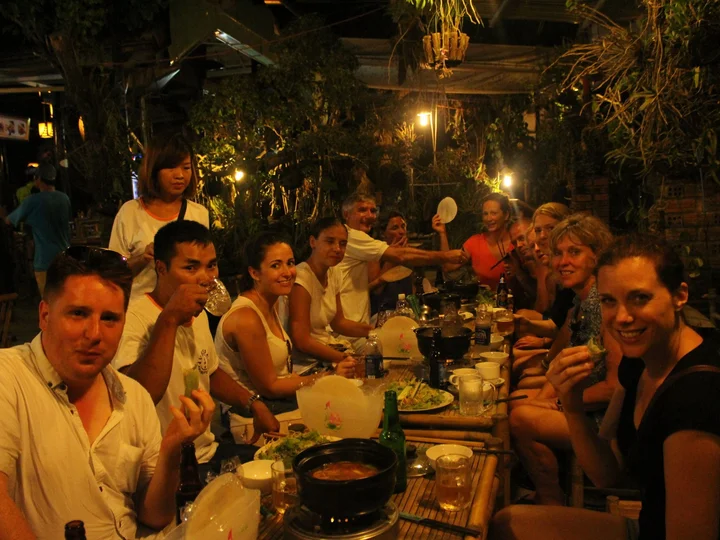 Hoi An - Vespa street food tour. Enjoying hotpot