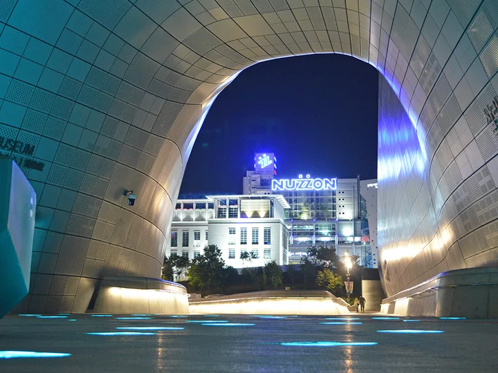 Modern and vibrant architecture with neon lights in downtown Seoul