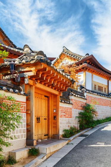 Wooden door entrance to traditional Korean Hanok house