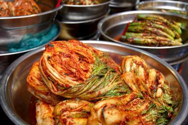 Spicy Korean cabbage in a stainless steel bowl 
