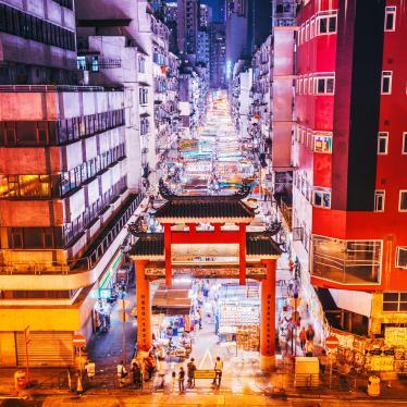 Aerial view of night market in middle of street in Hong Kong 