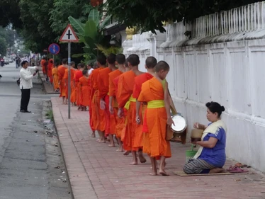 Monks collecting alms in Luang Prabang