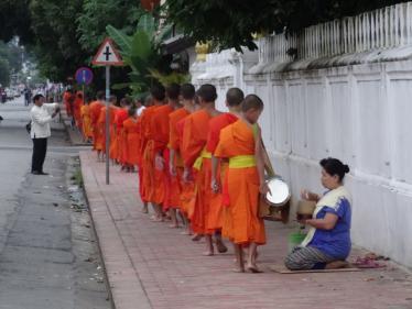 Monks collecting alms in Luang Prabang