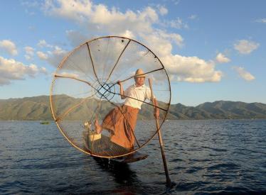 Traditional fishing and one-leg paddling on Inle Lake, Myanmar