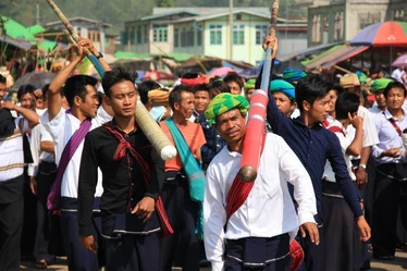 (High school student and his teacher carrying firecrackers)